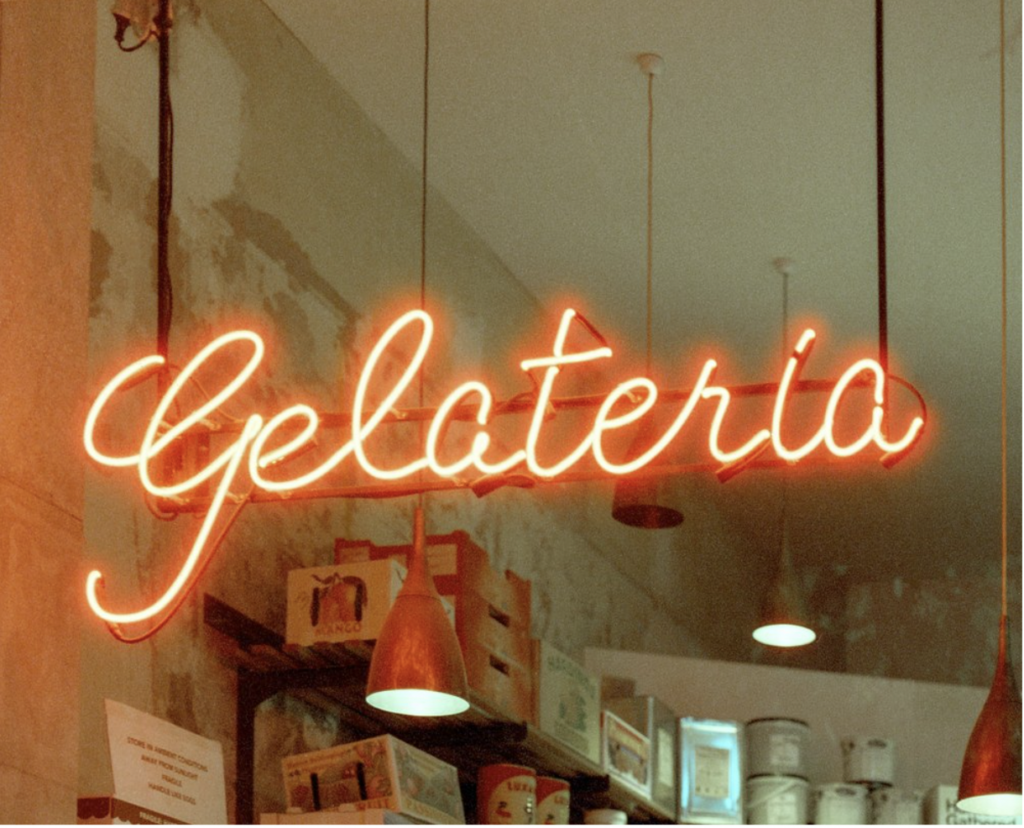 A neon sign that says Gelateria 